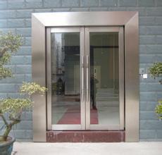 北京西罗园更换玻璃幕墙安装钢化玻璃自动门